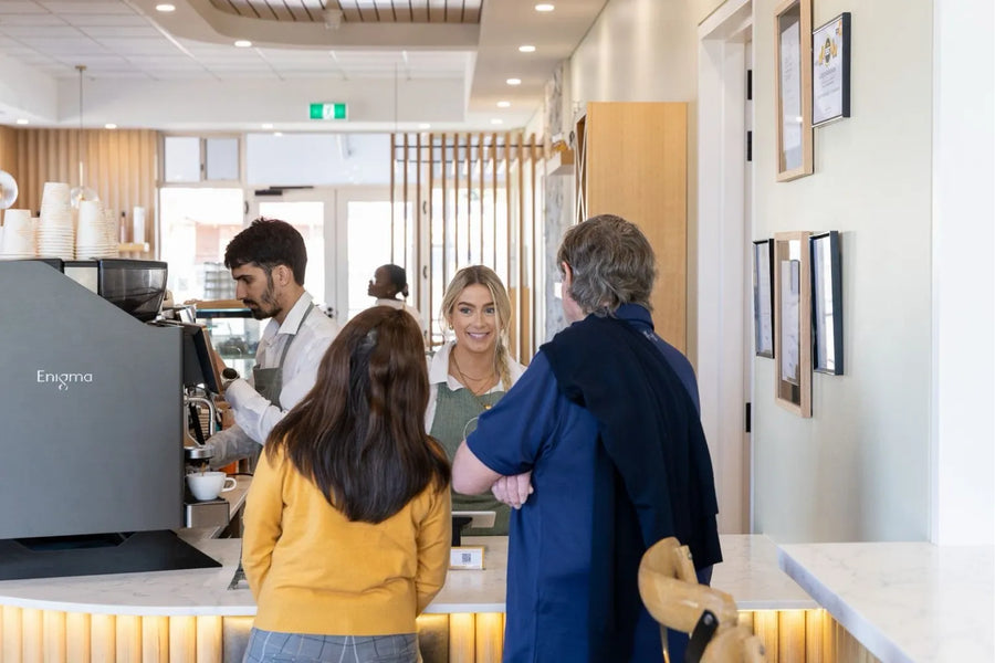 Locals ordering at the counter of L'Anse French Café, Port Lincoln