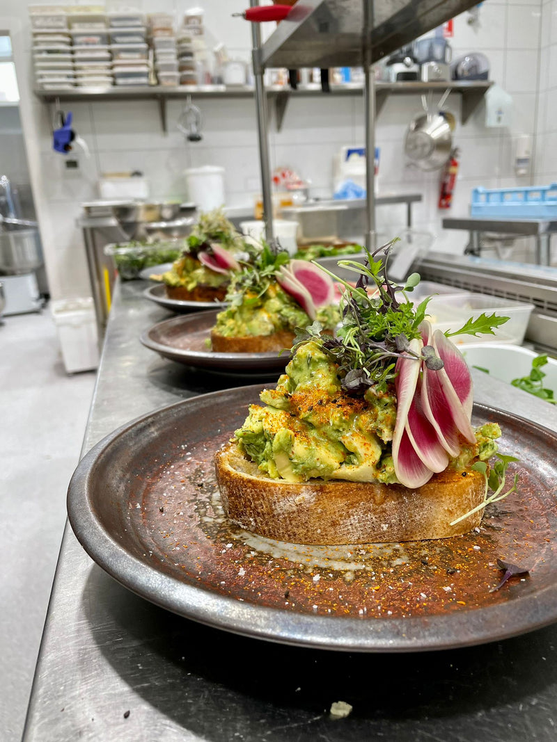 Citrus Avocado Toast, available on gluten-free bread at L'Anse French Café in Port Lincoln