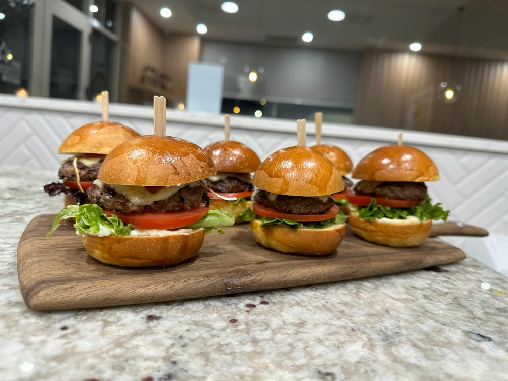 Smoky beef burgers on brioche buns at L'Anse French Café, Port Lincoln