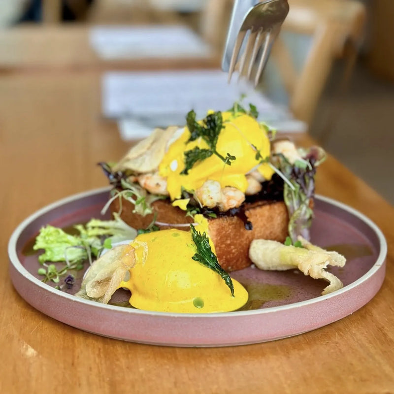 Mushroom Benedict with potato rösti, poached eggs and hollandaise, available gluten-free at L'Anse French Café, Port Lincoln